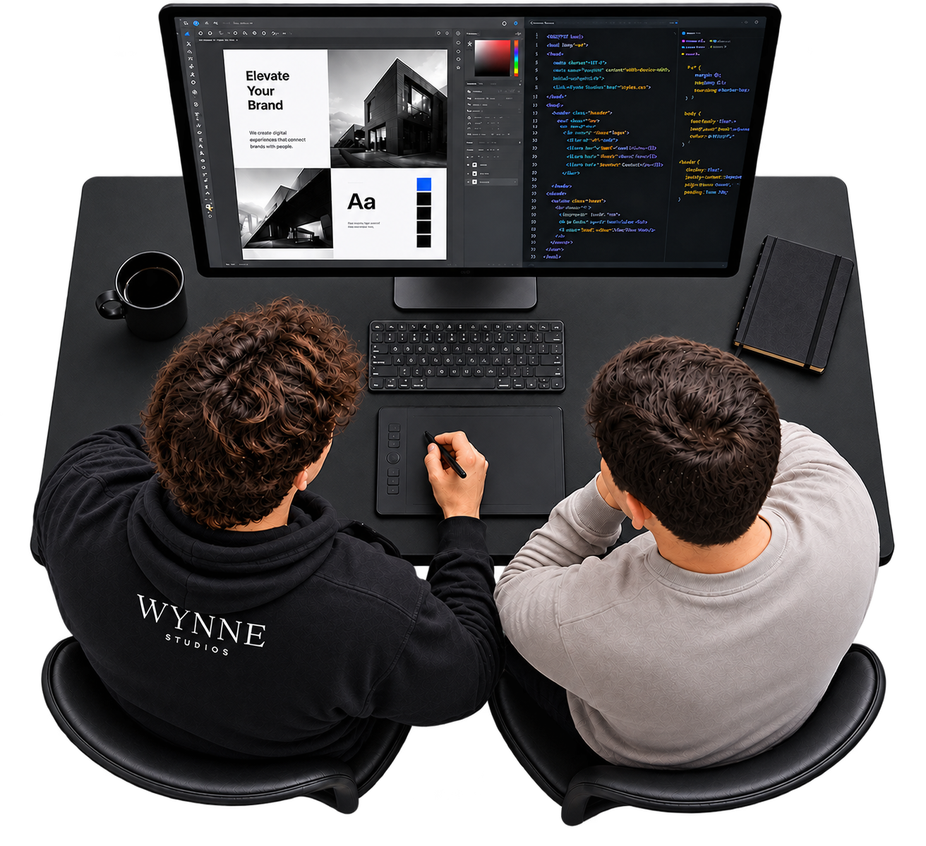 Two people working together at a desk